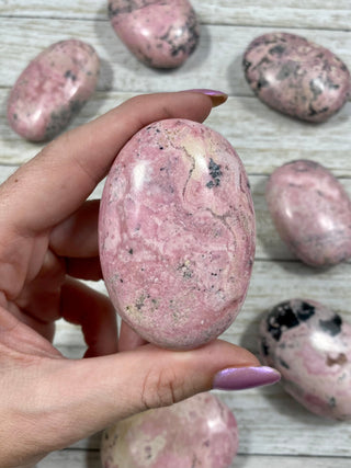 Rhodonite Palmstone from Peru from Curious Muse Crystals for 24. Tagged with crystal, crystal energy, palm stone, palmstone, peru, pink, polished, reiki healing, Rhodonite