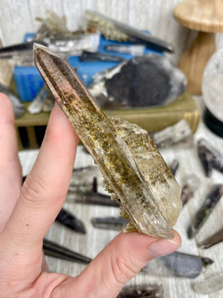 Quartz with Hematite and Lithium inclusions | Afghanistan from Curious Muse Crystals Tagged with Afghanistan, hematite, hematite red quartz, Laser quartz, lithium, Lithium quartz, Specular hematite