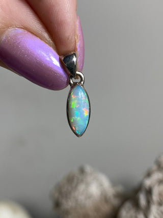 Welo Opal in Sterling Silver Pendant from Curious Muse Crystals Tagged with crystal healing, Crystal Jewelry, energy work, Ethiopian opal, flashy opal, hide-notify-btn, october crystal, opal crystal pendant, rainbow, reiki crystal, Sterling, sterling silver, Welo Opal, white opal pendant, witchy jewelry