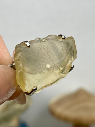Libyan Desert Glass in Sterling Silver Pendant from Curious Muse Crystals Tagged with desert glass, hide-notify-btn, libya, necklace, Pendant, sterling silver, tektite, yellow