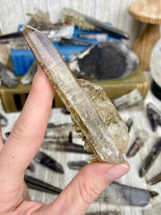 Quartz with Hematite and Lithium inclusions | Afghanistan from Curious Muse Crystals Tagged with Afghanistan, hematite, hematite red quartz, Laser quartz, lithium, Lithium quartz, Specular hematite