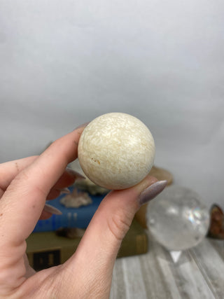 Scolecite Sphere from Curious Muse Crystals Tagged with crystal sphere, fine mineral, india, quartz, scolecite, sphere, zeolite