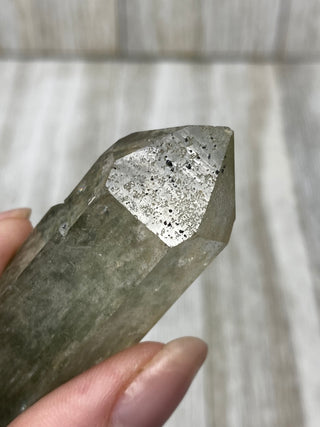 Nirvana Quartz Double Termination with Green Chlorite | High-Altitude Himalayan Crystal from Curious Muse Crystals Tagged with chlorite inclusion, clear, green, green Quartz, hand mined crystal, hide-notify-btn, high altitude quartz, High vibration stone, Himalayan Quartz, manifesting Quartz, Nirvana Quartz