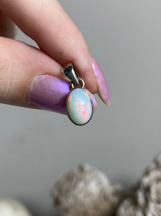 Welo Opal in Sterling Silver Pendant from Curious Muse Crystals Tagged with crystal healing, Crystal Jewelry, energy work, Ethiopian opal, flashy opal, hide-notify-btn, october crystal, opal crystal pendant, rainbow, reiki crystal, Sterling, sterling silver, Welo Opal, white opal pendant, witchy jewelry