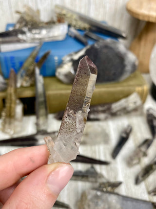 Quartz with Hematite and Lithium inclusions | Afghanistan from Curious Muse Crystals Tagged with Afghanistan, hematite, hematite red quartz, Laser quartz, lithium, Lithium quartz, Specular hematite