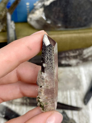 Quartz with Hematite and Lithium inclusions | Afghanistan from Curious Muse Crystals Tagged with Afghanistan, hematite, hematite red quartz, Laser quartz, lithium, Lithium quartz, Specular hematite