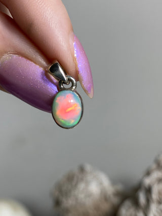 Welo Opal in Sterling Silver Pendant from Curious Muse Crystals Tagged with crystal healing, Crystal Jewelry, energy work, Ethiopian opal, flashy opal, hide-notify-btn, october crystal, opal crystal pendant, rainbow, reiki crystal, Sterling, sterling silver, Welo Opal, white opal pendant, witchy jewelry