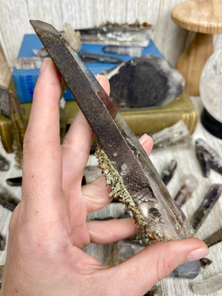 Quartz with Hematite and Lithium inclusions | Afghanistan from Curious Muse Crystals Tagged with Afghanistan, hematite, hematite red quartz, Laser quartz, lithium, Lithium quartz, Specular hematite