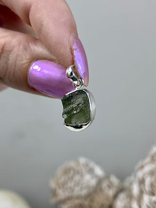Moldavite in Sterling Silver Pendant | Genuine Tektite from Czech Republic from Curious Muse Crystals Tagged with clear, Crown crystal, crystal jewelry, genuine tektite, green, hide-notify-btn, moldavite, natural moldavite, sterling silver, tektite, Third eye stone, transformation