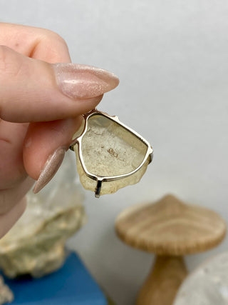 Libyan Desert Glass in Sterling Silver Pendant from Curious Muse Crystals Tagged with desert glass, hide-notify-btn, libya, necklace, Pendant, sterling silver, tektite, yellow