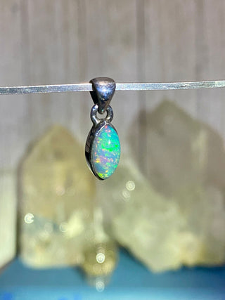 Welo Opal in Sterling Silver Pendant from Curious Muse Crystals Tagged with crystal healing, Crystal Jewelry, energy work, Ethiopian opal, flashy opal, hide-notify-btn, october crystal, opal crystal pendant, rainbow, reiki crystal, Sterling, sterling silver, Welo Opal, white opal pendant, witchy jewelry