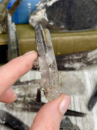 Quartz with Hematite and Lithium inclusions | Afghanistan from Curious Muse Crystals Tagged with Afghanistan, hematite, hematite red quartz, Laser quartz, lithium, Lithium quartz, Specular hematite