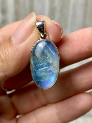 Rainbow Moonstone in Sterling Silver Pendant from Curious Muse Crystals Tagged with big crystal necklace, blue, blue crystal jewelry, blue moonstone, crystal energy, Crystal Jewelry, moonstone, natural moonstone, Pendant, rainbow moonstone, reiki healing, silver crystal jewel, Sterling, sterling silver