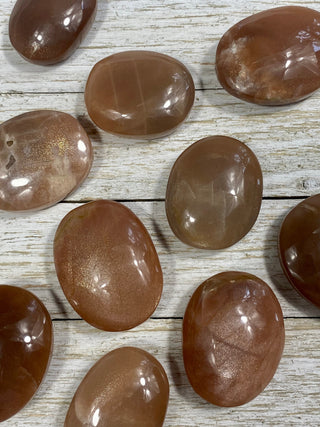 Sunstone with Moonstone Flashy Palm Stone from Curious Muse Crystals Tagged with Feldspar, moonstone, orange, orthoclase, orthoclase feldspar, palm stone, palmstone, sunstone
