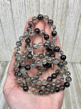 Tourmaline in Quartz 8mm Round Bead Crystal Bracelet from Curious Muse Crystals Tagged with 8mm beads, black, bracelet, clear, crystal jewelry, gemstone bead, gemstone jewelry, healing jewelry, inclusion quartz, tourmaline