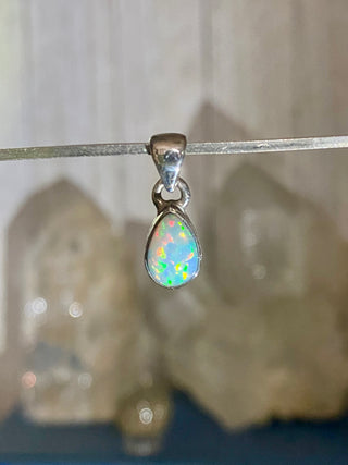 Welo Opal in Sterling Silver Pendant from Curious Muse Crystals Tagged with crystal healing, Crystal Jewelry, energy work, Ethiopian opal, flashy opal, hide-notify-btn, october crystal, opal crystal pendant, rainbow, reiki crystal, Sterling, sterling silver, Welo Opal, white opal pendant, witchy jewelry