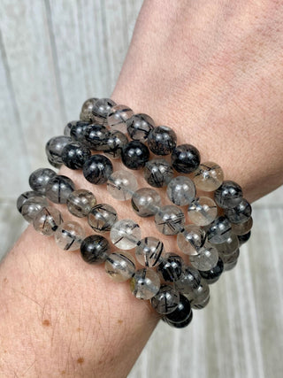 Tourmaline in Quartz 8mm Round Bead Crystal Bracelet from Curious Muse Crystals Tagged with 8mm beads, black, bracelet, clear, crystal jewelry, gemstone bead, gemstone jewelry, healing jewelry, inclusion quartz, tourmaline