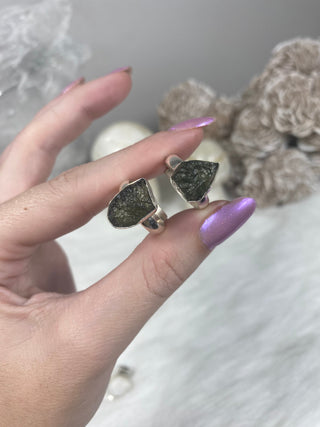 Moldavite in Sterling Silver Adjustable Ring | Genuine Tektite from Czech Republic from Curious Muse Crystals for 88. Tagged with adjustable ring, clear, Crown crystal, crystal jewelry, genuine tektite, green, moldavite, natural moldavite, sterling silver, tektite, Third eye stone, transformation