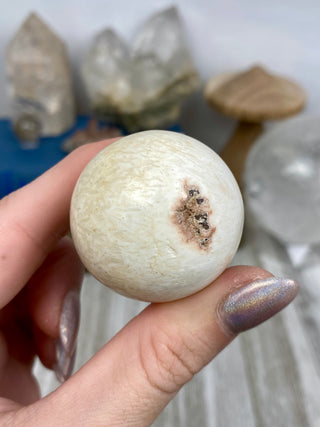 Scolecite Sphere from Curious Muse Crystals Tagged with crystal sphere, fine mineral, india, quartz, scolecite, sphere, zeolite