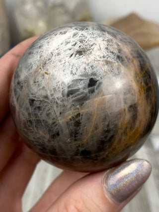 Black Moonstone Sphere | Flashy Orthoclase from Curious Muse Crystals Tagged with black, black moonstone, Crystal healing, genuine crystal, hide-notify-btn, moonstone, orthoclase, silver, sphere