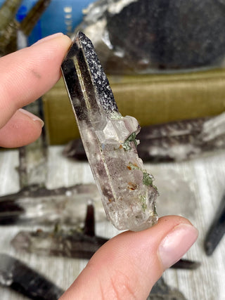 Quartz with Hematite and Lithium inclusions | Afghanistan from Curious Muse Crystals Tagged with Afghanistan, hematite, hematite red quartz, Laser quartz, lithium, Lithium quartz, Specular hematite