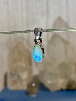 Welo Opal in Sterling Silver Pendant from Curious Muse Crystals Tagged with crystal healing, Crystal Jewelry, energy work, Ethiopian opal, flashy opal, hide-notify-btn, october crystal, opal crystal pendant, rainbow, reiki crystal, Sterling, sterling silver, Welo Opal, white opal pendant, witchy jewelry