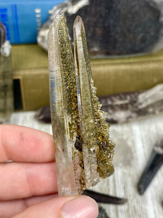 Quartz with Hematite and Lithium inclusions | Afghanistan from Curious Muse Crystals Tagged with Afghanistan, hematite, hematite red quartz, Laser quartz, lithium, Lithium quartz, Specular hematite