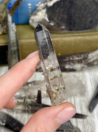 Quartz with Hematite and Lithium inclusions | Afghanistan from Curious Muse Crystals Tagged with Afghanistan, hematite, hematite red quartz, Laser quartz, lithium, Lithium quartz, Specular hematite