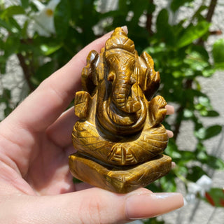 Tigers Eye Ganesha Hand-carved in Kathmandu, Nepal from Curious Muse Crystals Tagged with brown, confidence stone, crystal carving, crystal ganesha, ganesh statue, hand carved idol, healing crystal, high vibration, hindu god, obstacle breaker, reiki work, road opener, tiger eye, tiger eye ganesha, yellow