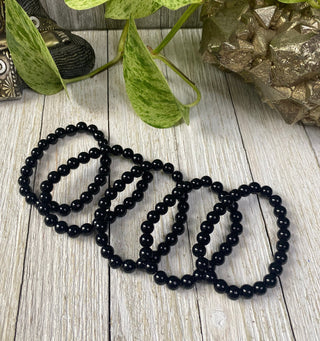 Black Onyx 8mm Round Bead Crystal Bracelet from Curious Muse Crystals Tagged with 8mm beads, balance stone, black, black onyx, black stone beads, bracelet, crystal bracelet, crystal jewelry, gemstone bead, gemstone jewelry, grounding, healing jewelry, natural crystal, onyx bead bracelet, protection bracelet