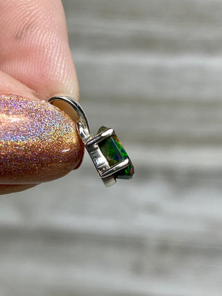 Black Opal in Sterling Silver Pendant from Curious Muse Crystals for 70. Tagged with black opal, crystal healing, Crystal Jewelry, energy work, flashy opal, hide-notify-btn, opal, opal crystal pendant, reiki crystal, Sterling, sterling silver, witchy