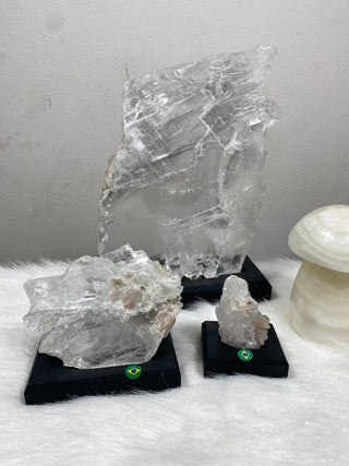 Selenite Raw Specimen on Wood Base | Brazil from Curious Muse Crystals for 35. Tagged with bracelet, brazil, clear, crystal, hide-notify-btn, on stand, raw mineral, raw selenite, selenite