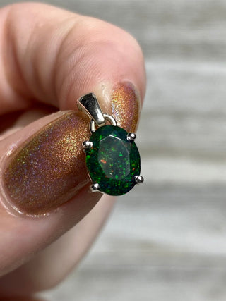 Black Opal in Sterling Silver Pendant from Curious Muse Crystals for 70. Tagged with black opal, crystal healing, Crystal Jewelry, energy work, flashy opal, hide-notify-btn, opal, opal crystal pendant, reiki crystal, Sterling, sterling silver, witchy