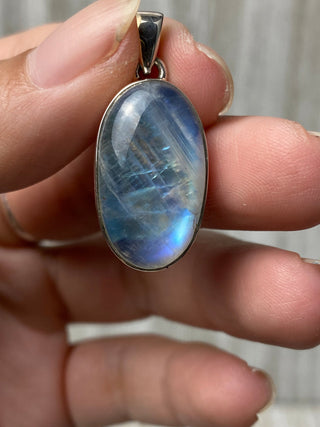 Rainbow Moonstone in Sterling Silver Pendant from Curious Muse Crystals Tagged with big crystal necklace, blue, blue crystal jewelry, blue moonstone, crystal energy, Crystal Jewelry, moonstone, natural moonstone, Pendant, rainbow moonstone, reiki hea