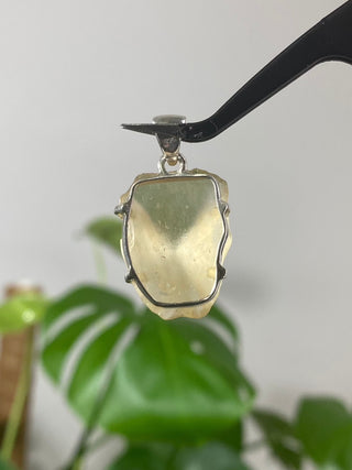 Libyan Desert Glass in Sterling Silver Pendant from Curious Muse Crystals for 49. Tagged with desert glass, hide-notify-btn, libya, necklace, Pendant, sterling silver, tektite, yellow