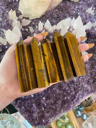 Tigers Eye Six Sided Tower - Confidence and Protection from Curious Muse Crystals Tagged with abundance stone, aura cleansing, brown, confidence, confidence crystal, crystal healing, crystal magic, Crystal tower, energy work, genuine crystal, protection, root chakra, solar plexus chakra, tigers eye, tower, yellow