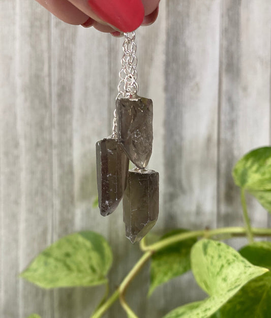 Smoky Quartz Triple Raw Point Pendant - Grounding from Curious Muse Crystals for 7.00. Tagged with balance stone, brown quartz, crystal jewelry, gemstone jewelry, grounding, healing jewelry, hide-notify-btn, natural crystal, necklace, raw point pendant, raw stone jewelry, smoky quartz, stress release