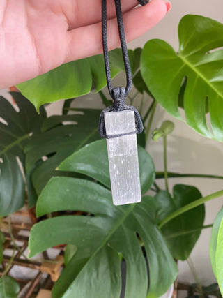 Selenite on Black Cord Necklace - Cleansing - Satin Spar from Curious Muse Crystals Tagged with cleansing stone, clear, crystal jewelry, crystal necklace, energy work, jewelry, mineral on cord, natural crystal, necklace, raw crystal, raw stone pendant, reiki healing, satin spar, selenite, white