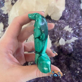 Malachite Animal Guide Carving - Snake from Curious Muse Crystals for 75. Tagged with animal carving, carving, green, hide-notify-btn, malachite, malachite polished, serpent, snake