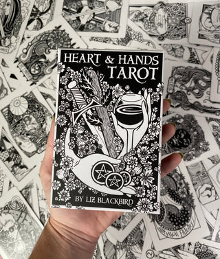 Heart & Hands Tarot - Alternative Divination - Black and White Tarot from U.S. Games Systems, Inc for 24.95. Tagged with alternative tarot, black and white, divination tool, floral tarot, intuitive divination, line drawn tarot, modern witch, rider waite smith, tarot, tarot deck, traditional tarot, with guidebook