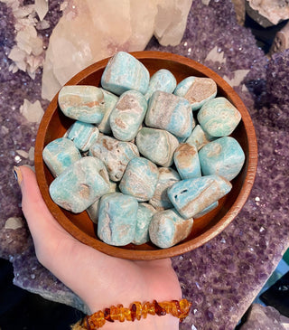 Blue Aragonite Tumbled Stone | UV Reactive from Curious Muse Crystals for 9. Tagged with anxiety stone, banded aragonite, blue, Crystal healing, earth healing, genuine crystal, geopathic stress, gridding crystal, grounding crystal, reiki work, stress release, tumbled stone