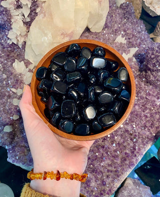 Obsidian Tumbled Stone - Protection from Curious Muse Crystals Tagged with black, black crystal, black obsidian, crystal for jewelry, Crystal healing, genuine crystal, lava glass, obsidian, obsidian tumble, protection charm, tumbled stone