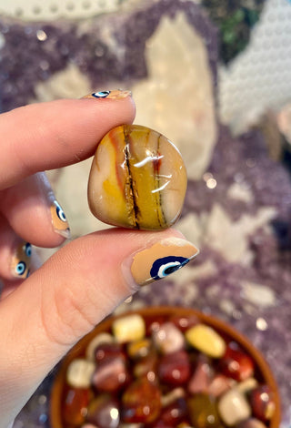Mookaite Tumbled Stone - Australian Jasper from Curious Muse Crystals Tagged with Crystal healing, genuine crystal, heart stone, high vibrational, January birthstone, jasper, mineral specimen, mookaite, purple, red, reiki work, tumbled stone, yellow