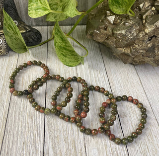 Unakite 8mm Round Bead Crystal Bracelet - Harmony & Alignment from Curious Muse Crystals Tagged with 8mm beads, balance stone, bracelet, crystal bracelet, crystal jewelry, epidote, gemstone bead, gemstone jewelry, green, healing jewelry, heart chakra, heart healing, natural crystal, pink, pink orthoclase, unakite, Unakite jewelry