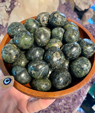 Nephrite Jade Tumbled Stone - Prosperity and Wealth from Curious Muse Crystals Tagged with Crystal healing, dark green Jade, genuine crystal, green, green Jade stone, high vibrational, jade, mineral specimen, nephrite Jade, reiki work, round Jade piece, tumbled stone