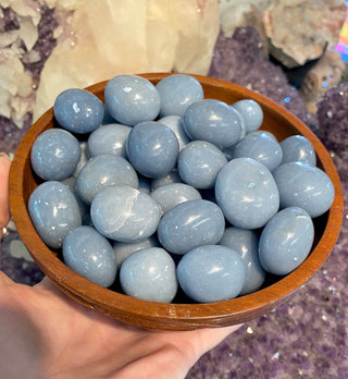 Angelite Tumbled Stone from Curious Muse Crystals Tagged with Angeline, angelite, anhydrite stone, blue, blue crystal, calming crystal, calming stone, cleansing crystal, communication stone, Crystal healing, genuine crystal, reiki work, throat chakra, tumbled stone