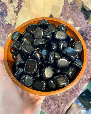 Obsidian Tumbled Stone - Protection from Curious Muse Crystals Tagged with black, black crystal, black obsidian, crystal for jewelry, Crystal healing, genuine crystal, lava glass, obsidian, obsidian tumble, protection charm, tumbled stone