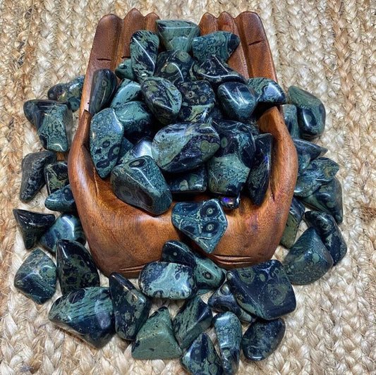 Kambaba Jasper Tumbled Stone from Curious Muse Crystals for 2.00. Tagged with fossil algae, genuine crystal, green jasper, grounding crystal, heart chakra, Kambaba jasper, money stone, stability stone, tumbled stone, tumbled stone green