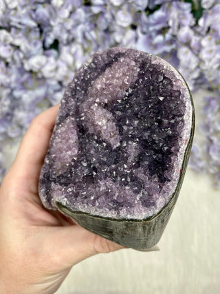 Amethyst over Calcite | Unique Formation | Cut Base Geode from Brazil from Curious Muse Crystals for 75. Tagged with aaa grade crystal, amethyst, Amethyst Cluster, amethyst on calcite, Brazilian amethyst, cut base amethyst, emotional balance, goethite amethyst, high grade, high vibrational, purple, spiritual protection, third eye, unique amethyst
