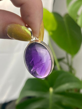 Amethyst in Sterling Silver Pendant from Curious Muse Crystals Tagged with amethyst, crystal energy, Crystal Jewelry, extra dark amethyst, hide-notify-btn, purple, reiki healing, silver crystal jewel, sterling silver, witchy jewelry